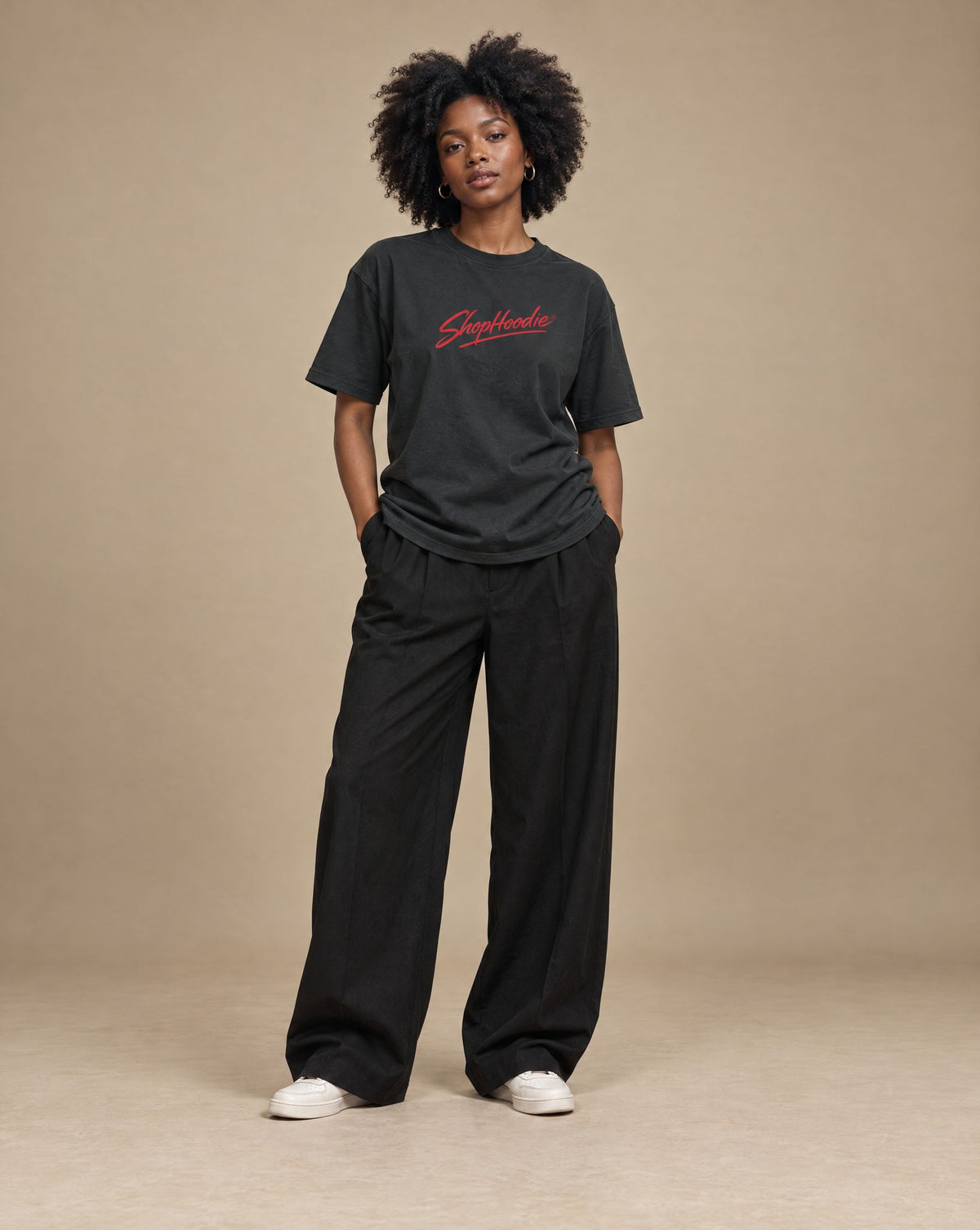 Female model wearing SHOPHOODIE Men's Performance Regular Fit T-Shirt — 180 GSM, studio shot