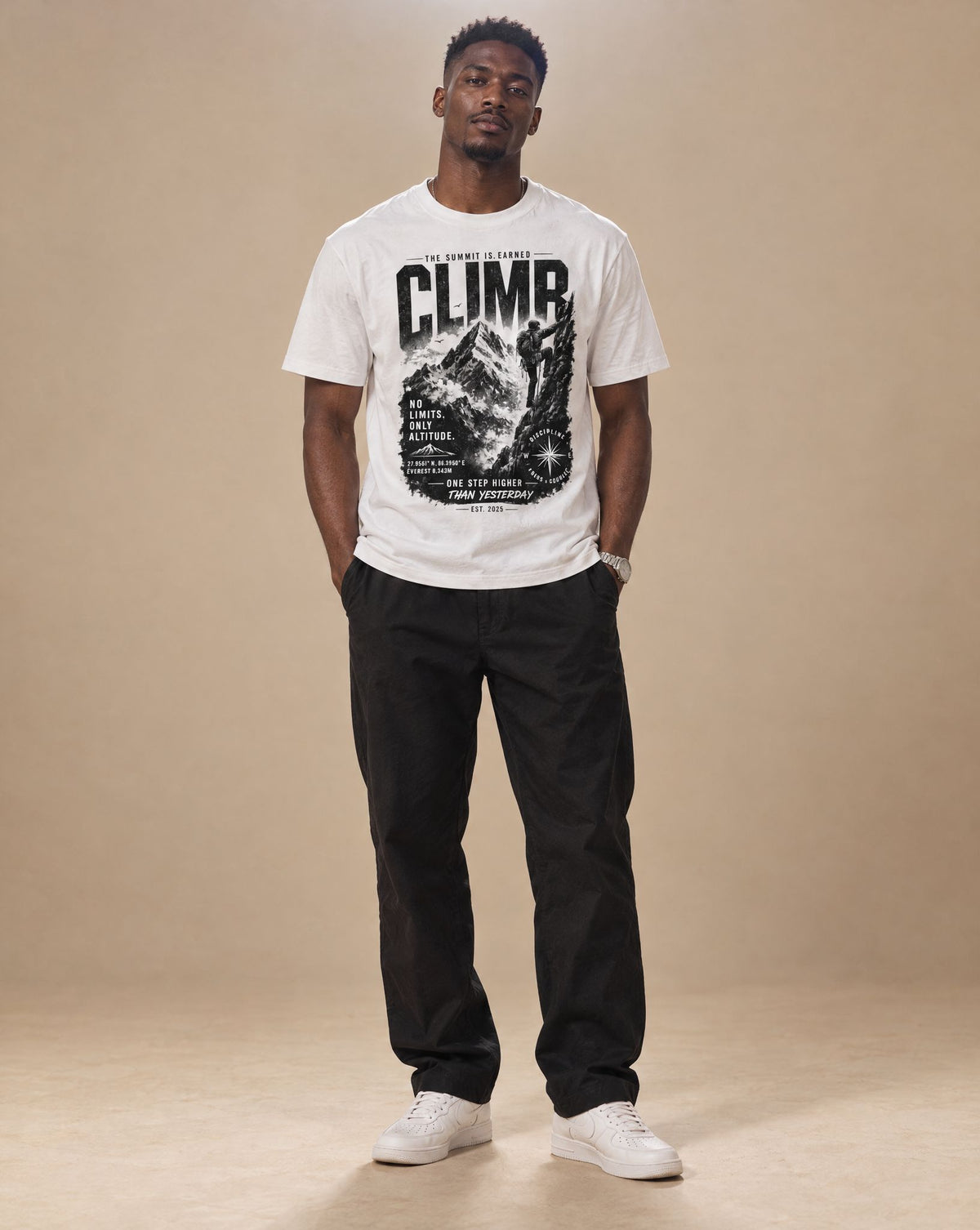 Male model wearing SHOPHOODIE MOUNTAIN CLIMBER Cotton T-Shirt — 260 GSM, studio shot