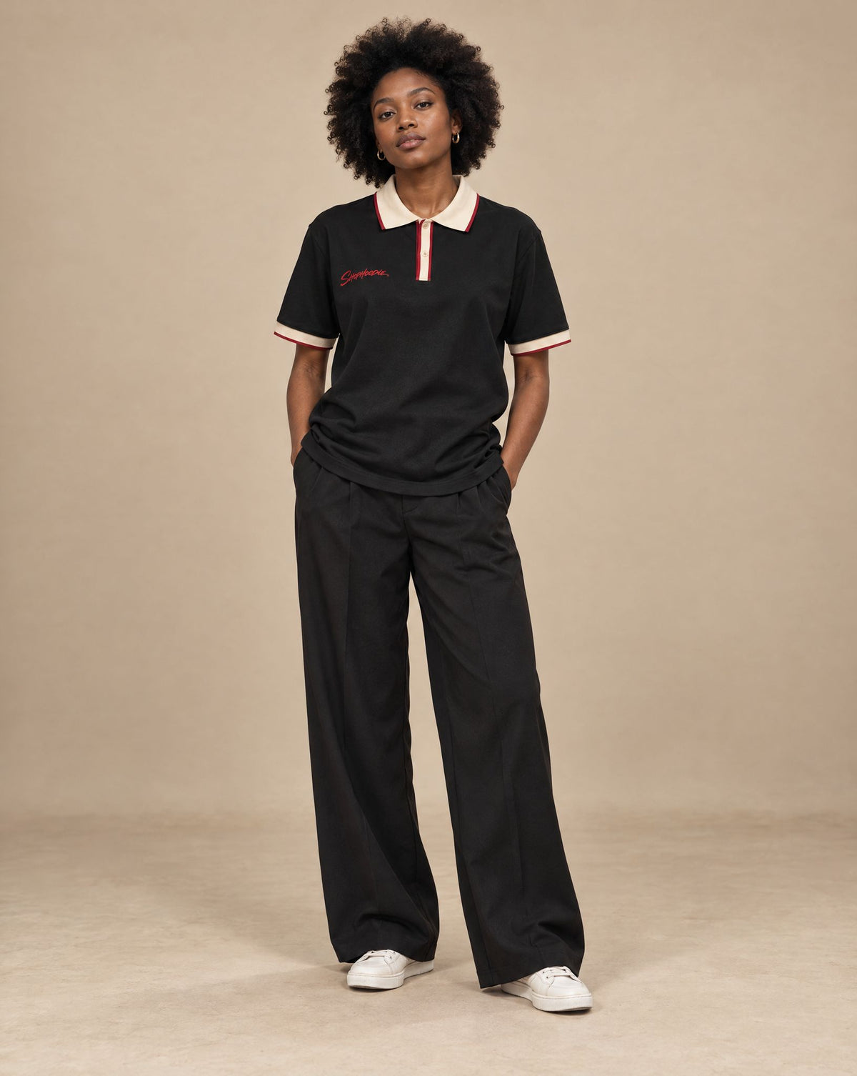 Female model wearing SHOPHOODIE AVANT Colour Block Polo Shirt — 240 GSM, studio shot
