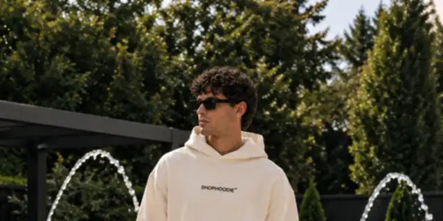SHOPHOODIE® cream hoodie and wide-leg sweatpants set by the pool