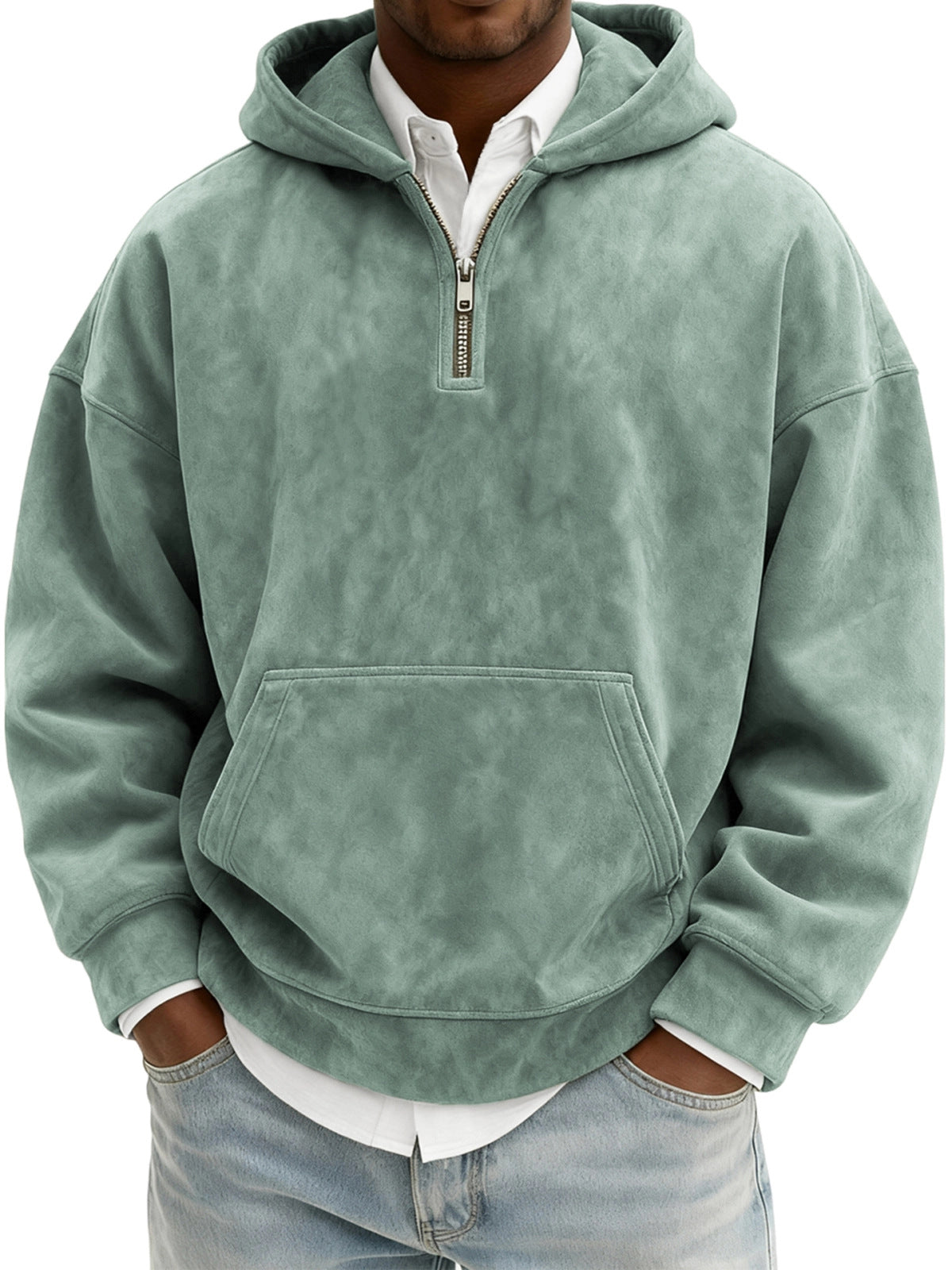 Person wearing a green hoodie with a zipper on a white background