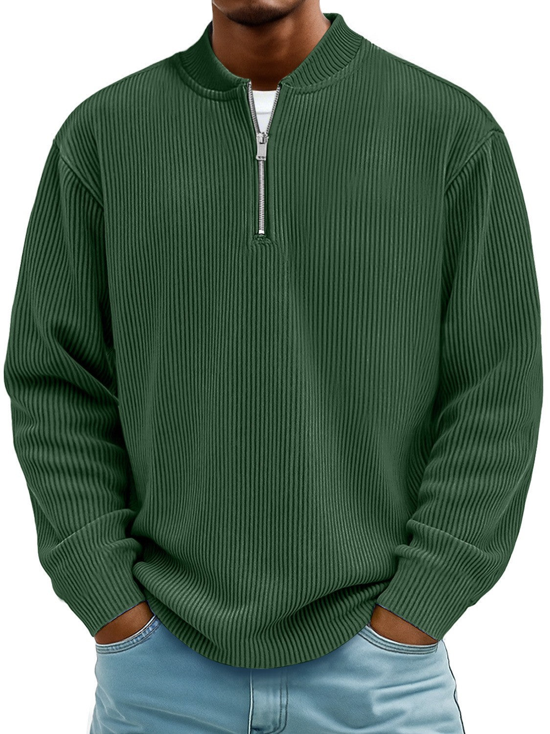 Green ribbed sweater worn by a person on a white background