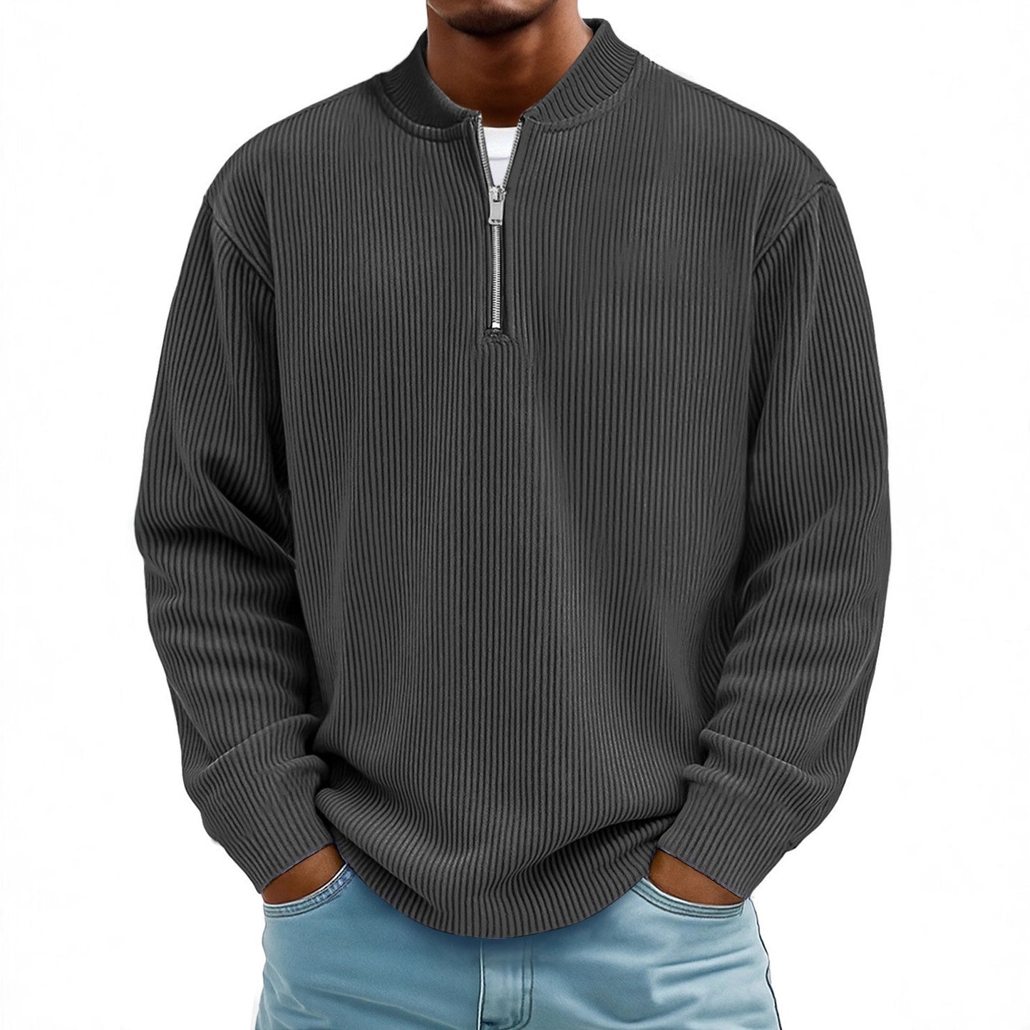 Man wearing a gray ribbed sweater with a quarter zip on a white background