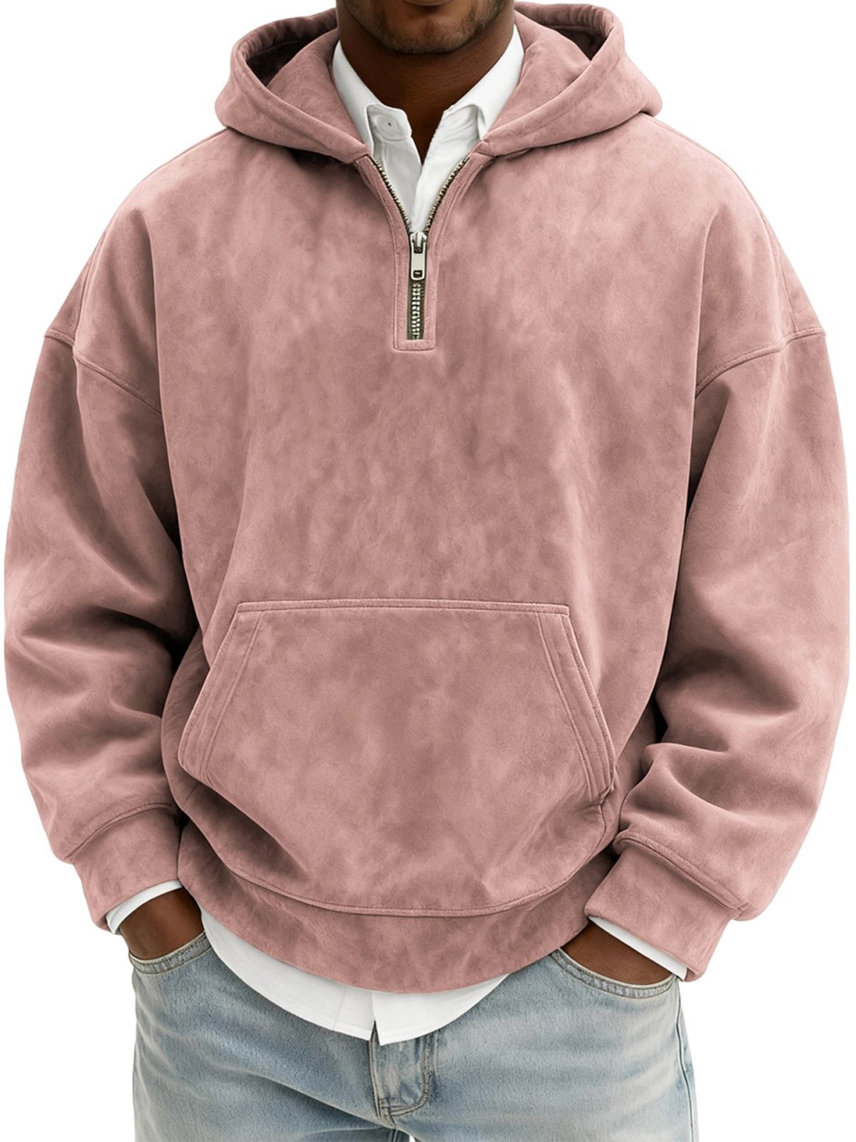 Person wearing a pink hooded pullover with a zipper on a white background