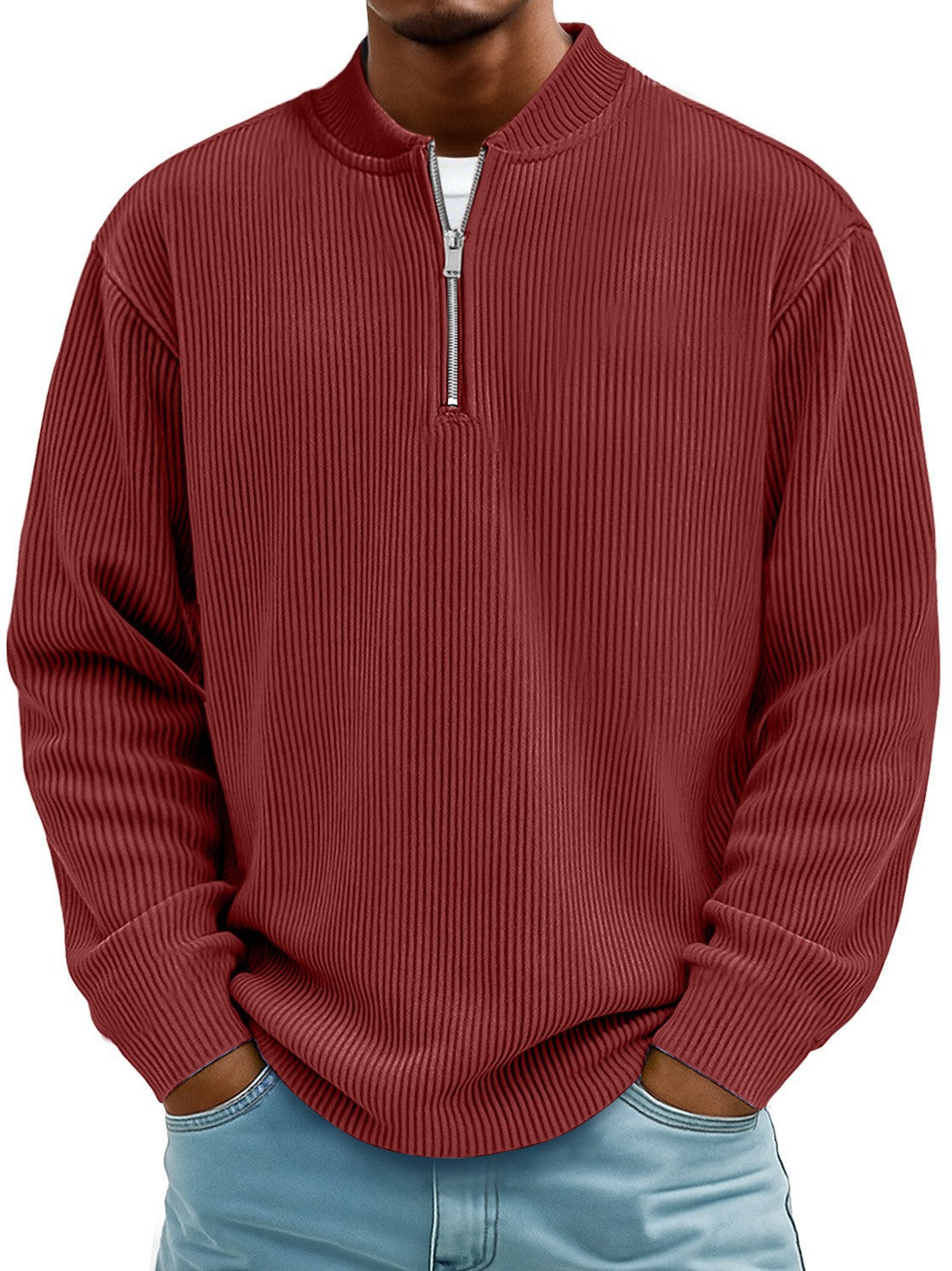 Red ribbed sweater worn by a person on a white background