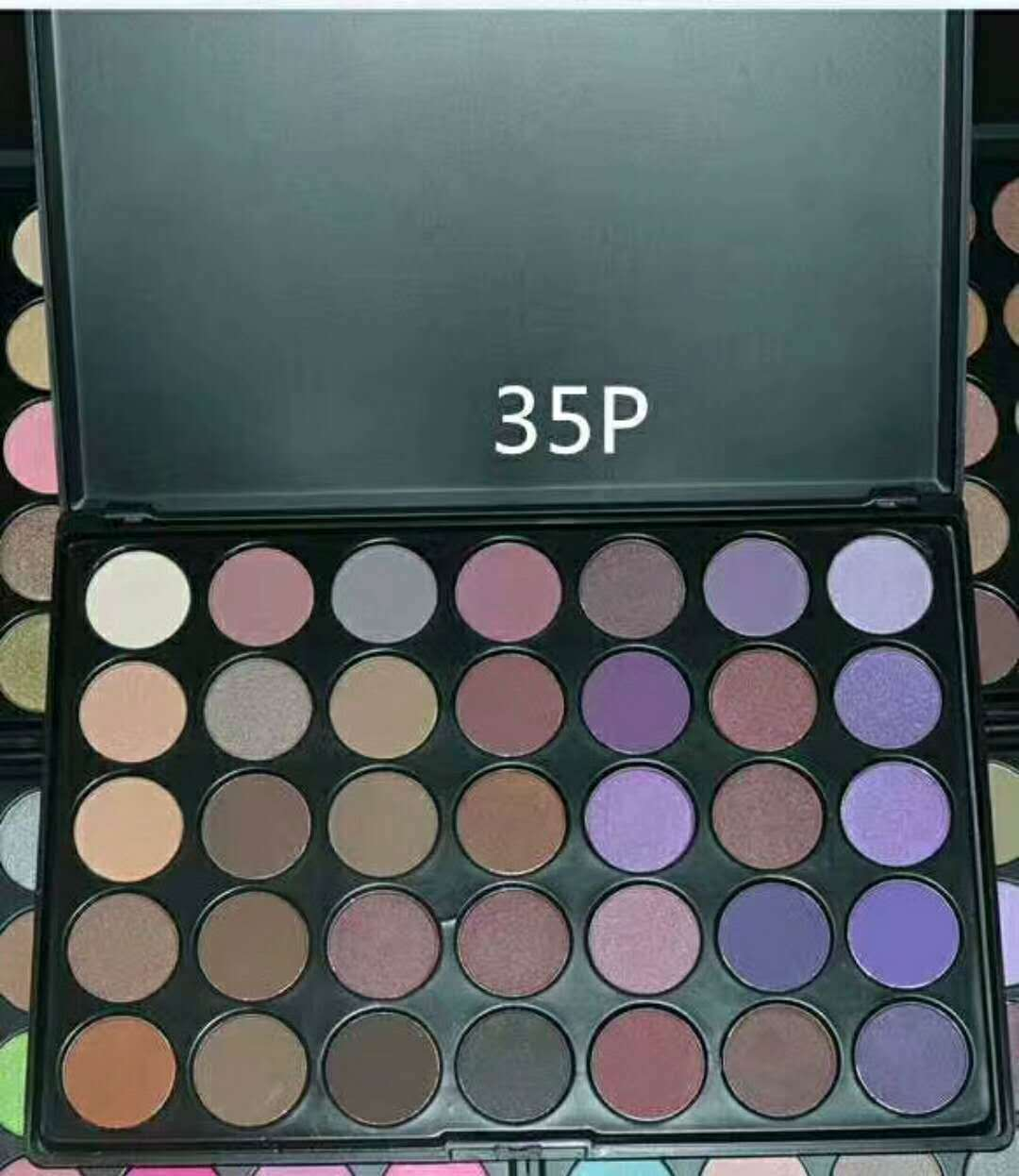Makeup palette with 35 shades of eyeshadows, open to show the colors.
