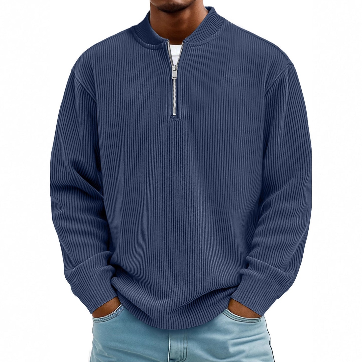 Blue ribbed sweater worn by a person on a white background