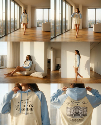Woman wearing a shophoodie hoodie with text and graphics in a modern living room.