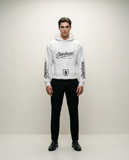 Person wearing a white hoodie with branding on a plain background