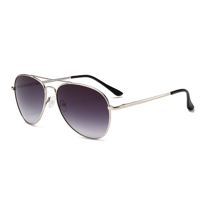 Silver-framed sunglasses with gradient lenses on a white background