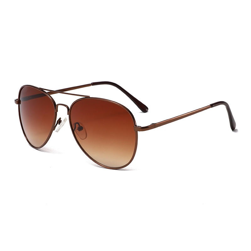 Brown sunglasses with a gradient lens on a white background
