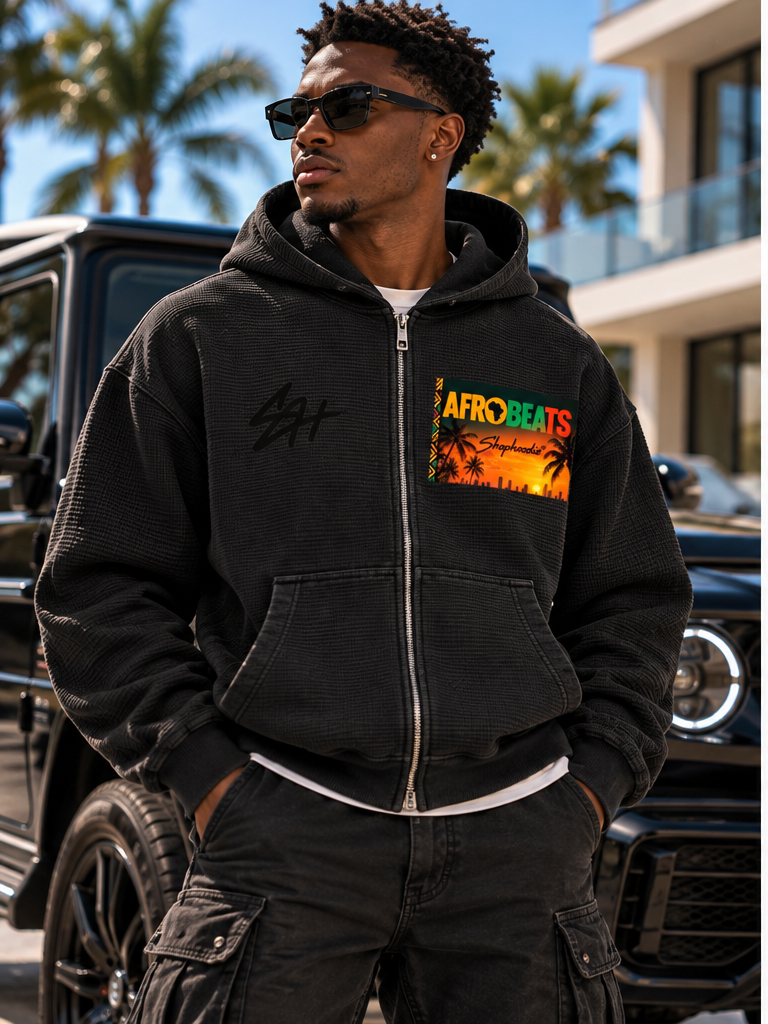 Male model wearing SHOPHOODIE AFROBEATS SH black waffle zip hoodie
