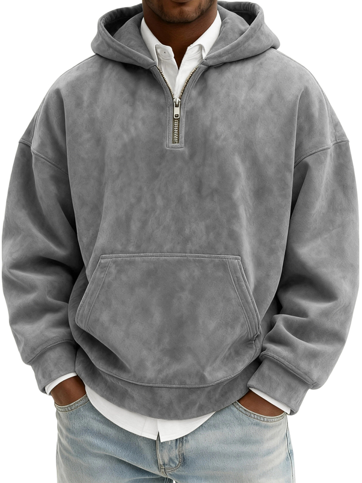 Person wearing a gray hoodie with a zipper on a white background