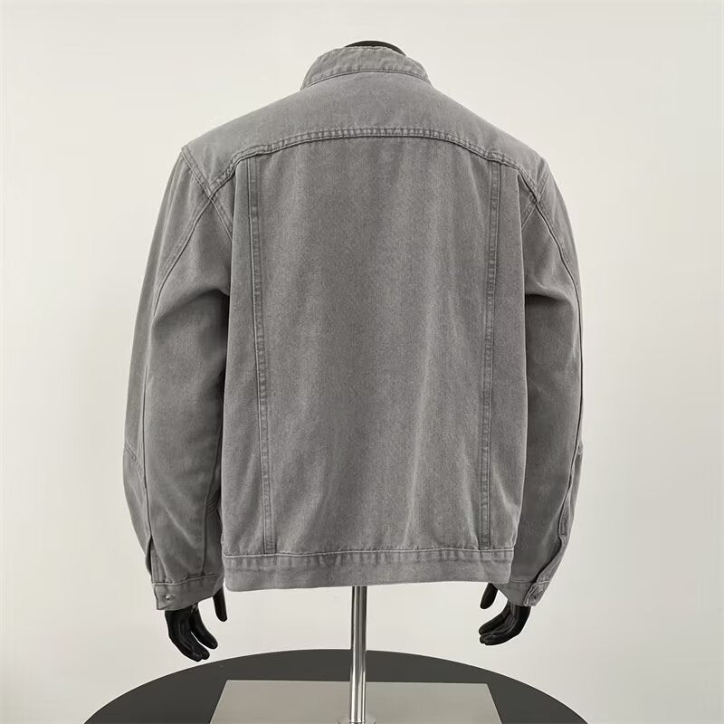 Gray denim jacket on a mannequin against a white background