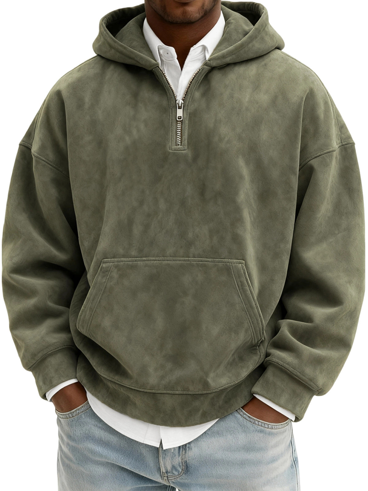 Person wearing a green pullover hoodie with a zipper on a white background