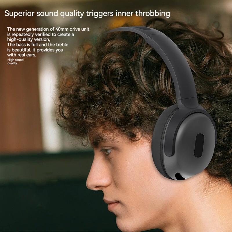 Person wearing black headphones with text about superior sound quality