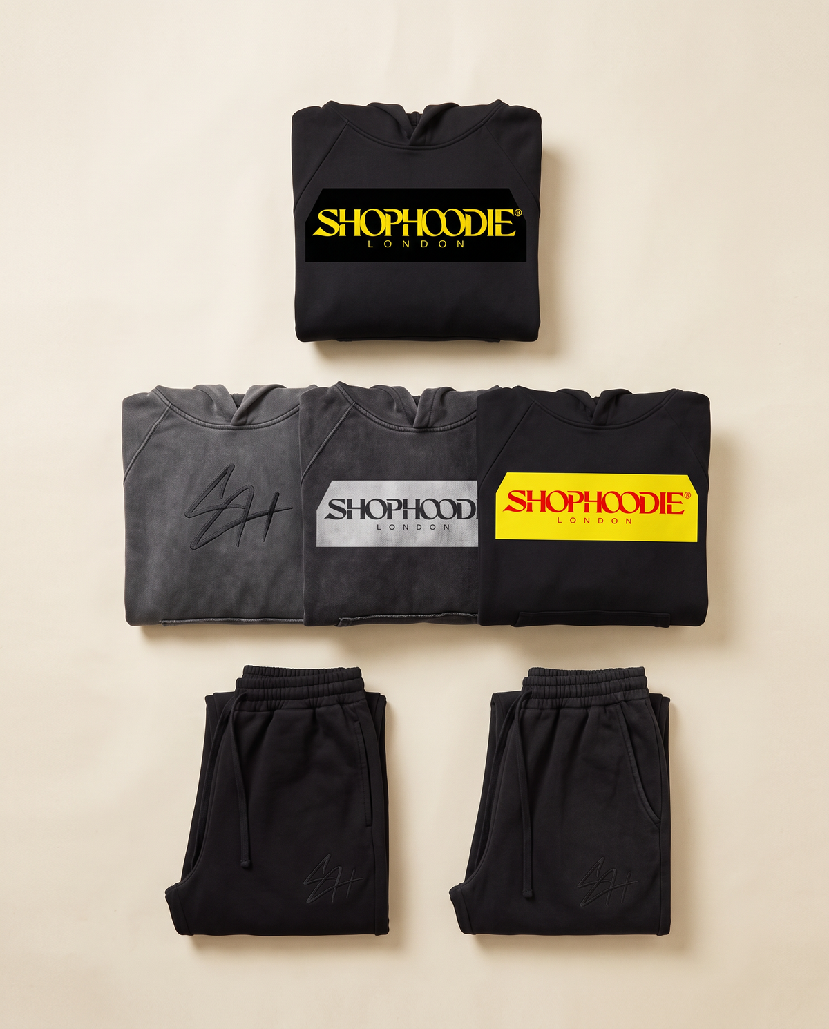 SHOPHOODIE® LONDON flat lay — vintage wash boxy hoodies and SH SIGNATURE sweatpants
