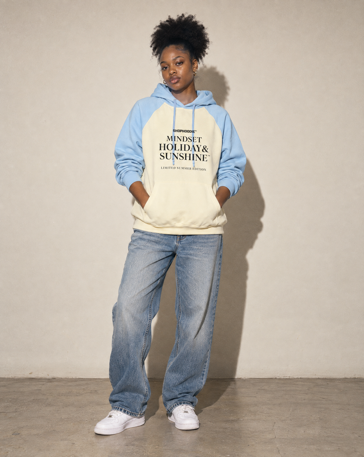 Amara wearing The SHOPHOODIE® Mindset Holiday & Sunshine Heavyweight Color-Block Raglan Hoodie — 380 GSM