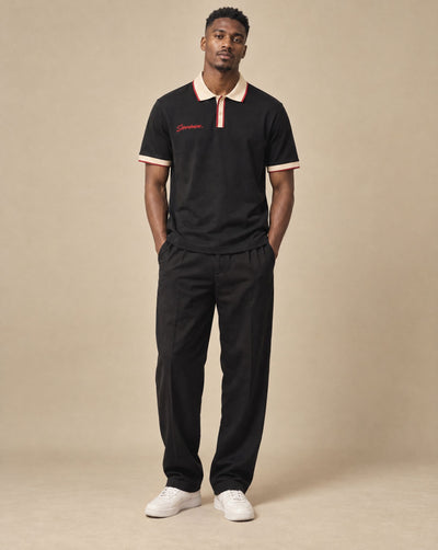 Male model wearing SHOPHOODIE AVANT Colour Block Polo Shirt — 240 GSM, studio shot