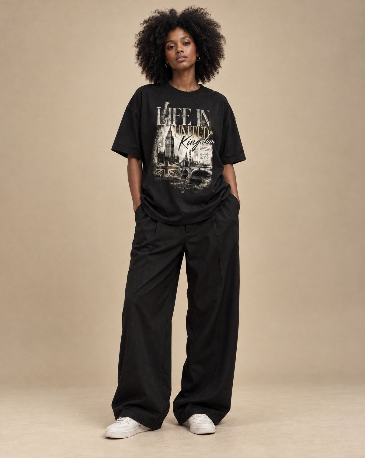 Amara wearing SHOPHOODIE® LIFE IN UNITED KINGDOM Unisex Oversized T-Shirt — 300 GSM