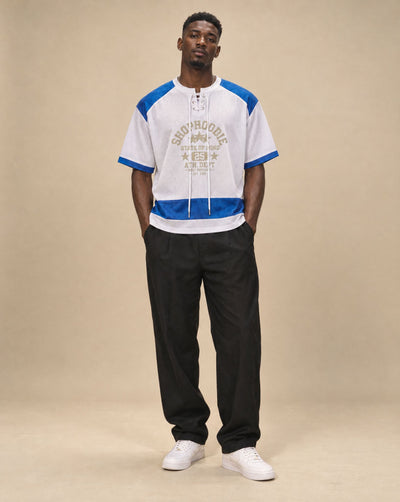 Male model wearing SHOPHOODIE STATE OF MIND Raglan-Sleeve Mesh Boxy T-Shirt, studio shot