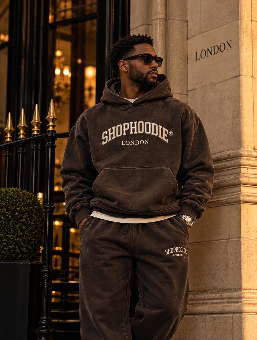 SHOPHOODIE London male model in charcoal coordinated hoodie and sweatpants, lifestyle concept